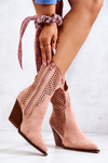Openwork cowboy boots on a post Pink Caroline