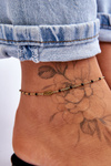 Fashionable anklet with a feather gold