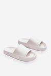 Fashionable Light Flip Flops On A Massive Sole White Rebel