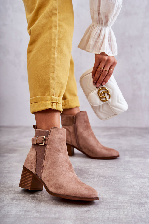 Suede boots on a post Brown Vannes