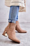 suede boots on a post with a decoration Beige Erine