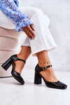 Fashionable Lacquered Pumps On A Bar Black Maoris