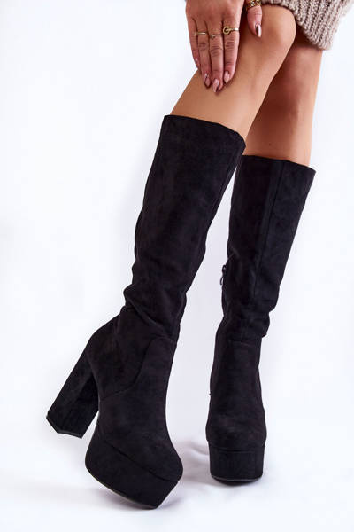 Suede boots on a massive heel and a platform black Nevira
