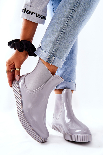 Shiny Rubber Boots Galoshes On A Platform Grey Waterfall