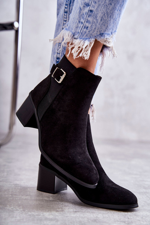 Suede boots on a post Black Vannes