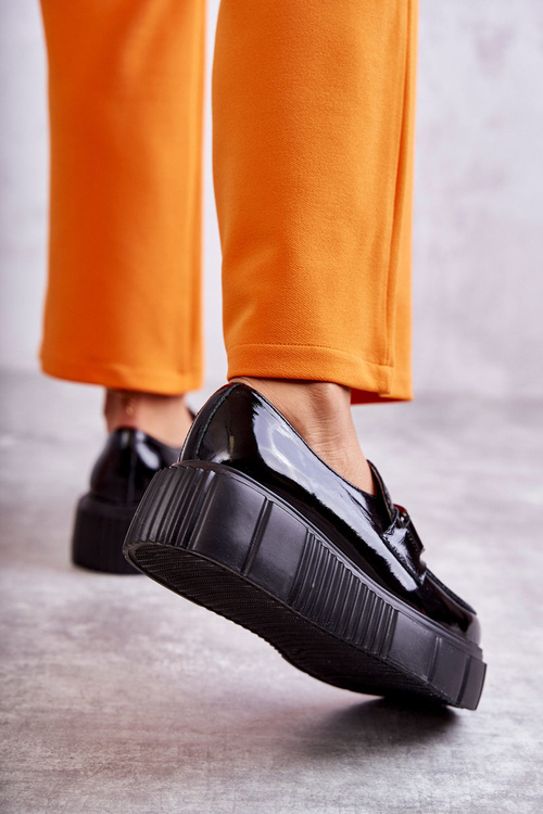 Fashionable leather shoes on the platform Black Marsol