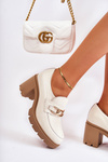 Leather shoes on a pillar with a golden decoration light beige Mikeyla