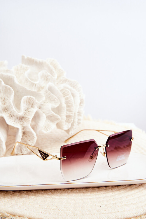 Women's sunglasses with shaded gold-brown lenses