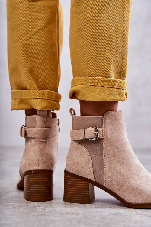 Suede boots on a post Beige Vannes