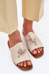 Women's sandals on a flat heel with decorative tying beige Norela