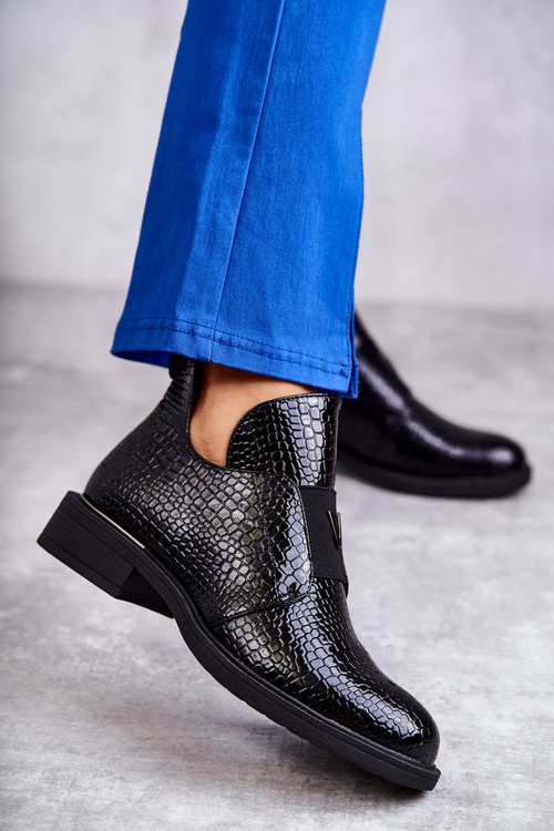 Laquered boots with cutouts on a flat heel Black Eunice