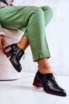 Laquered Fashionable shoes on a post black and red Lorena