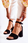 Fashionable Sandals On A Bar Black Salis