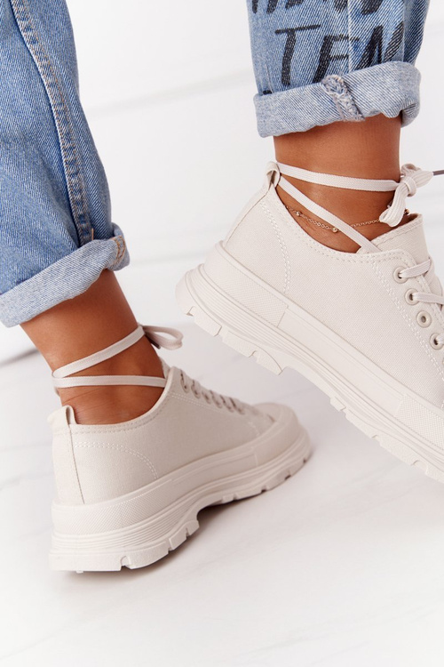 Sneakers On A Chunky Sole Beige Travel Time