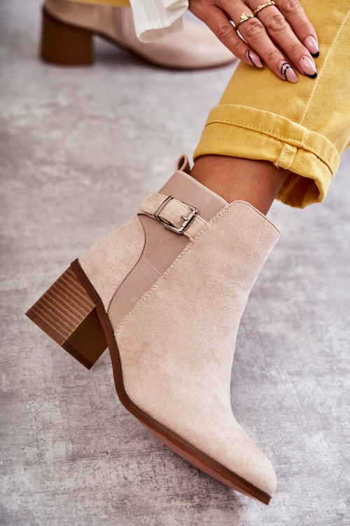 Suede boots on a post Beige Vannes