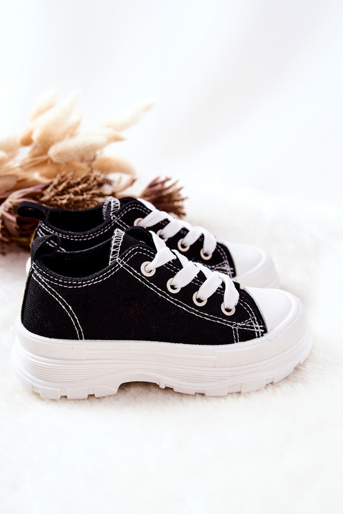 Children's Sneakers On A Platform Black and White Travel Time