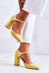 Fashionable Lacquered Pumps On A Bar Yellow Maoris