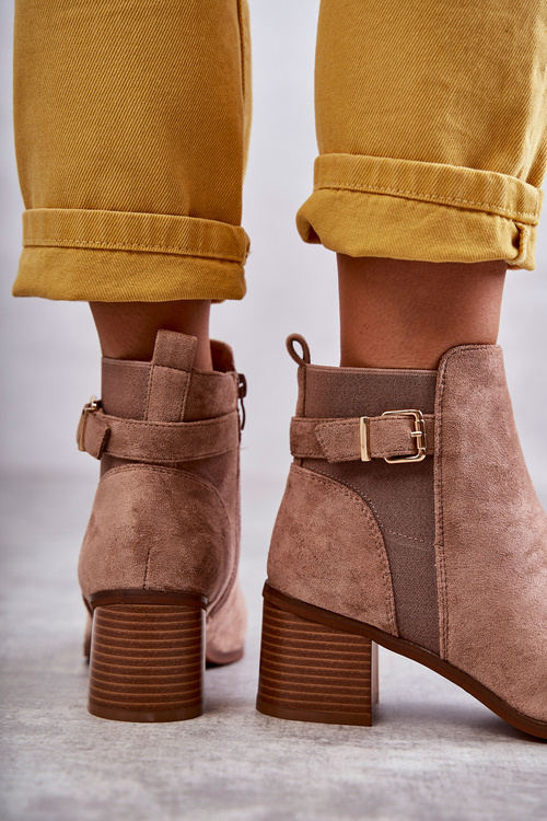 Suede boots on a post Brown Vannes