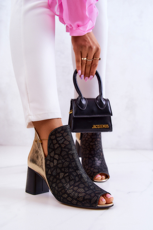 Leather boots on a post Maciejka 05507-01 Black and Gold