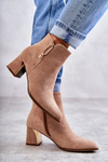 suede boots on a post with a decoration Beige Erine