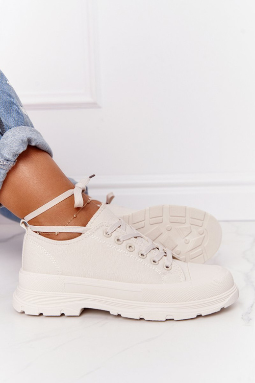Sneakers On A Chunky Sole Beige Travel Time