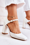 Fashionable Lacquered Pumps On A Bar White Maoris