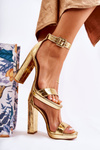 Fashionable Lacquered Sandals On A High Post Gold Perfection