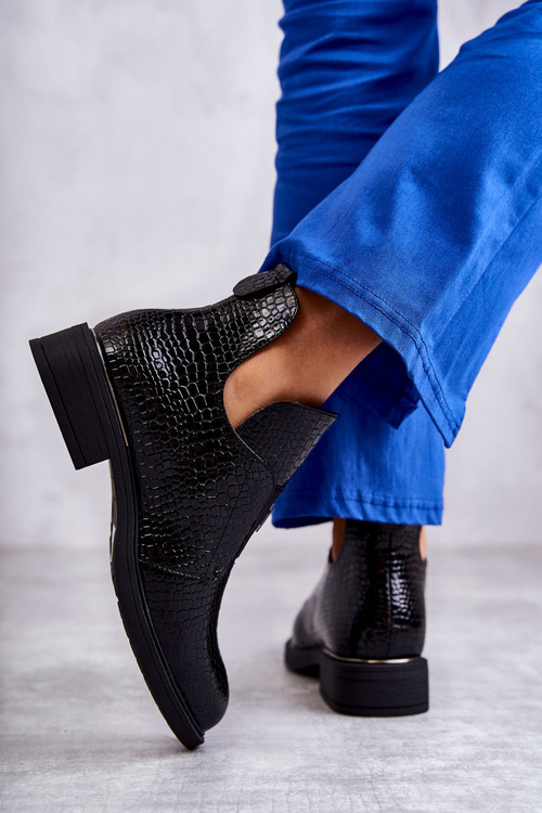 Laquered boots with cutouts on a flat heel Black Eunice