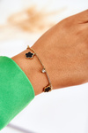Bracelet on a chain with flowers gold-black