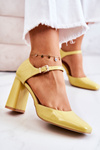 Fashionable Lacquered Pumps On A Bar Yellow Maoris