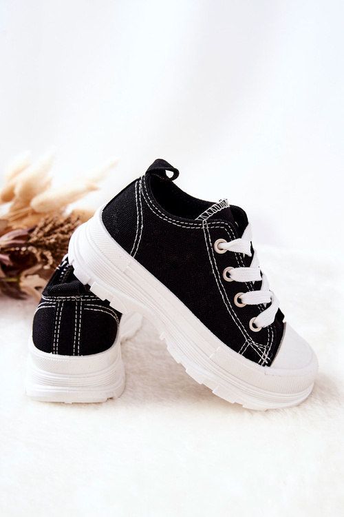 Children's Sneakers On A Platform Black and White Travel Time