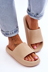 Fashionable Light Flip Flops On A Massive Sole Beige Rebel