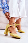 Fashionable Lacquered Pumps On A Bar Yellow Maoris