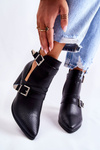 Fashionable boots on a post with cutouts black Suelo