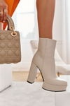 Smooth Leather Booties On A Bar Beige Kaysa