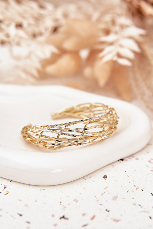 Stiff bracelet made of surgical steel gold