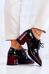 Lacquered shoes with a zipper in black and red Laurosa
