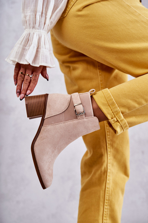 Suede boots on a post Beige Vannes