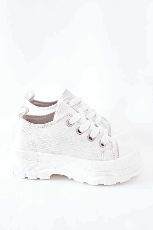 Children's Sneakers On A Platform White Travel Time