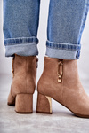 suede boots on a post with a decoration Beige Erine