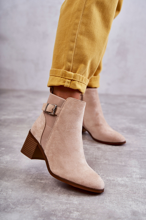 Suede boots on a post Beige Vannes