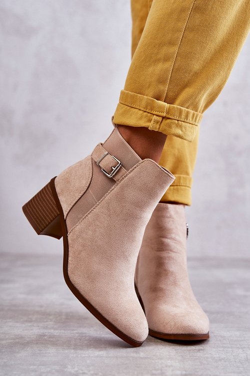 Suede boots on a post Beige Vannes