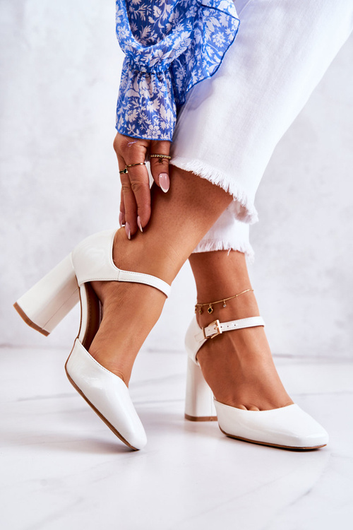 Fashionable Lacquered Pumps On A Bar White Maoris