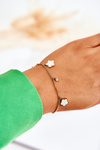 Bracelet on a chain with flowers gold-white