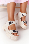 Sandals On A Chunky Platform Beige Fly High