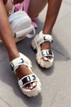 Sandals On A Chunky Platform Beige Fly High