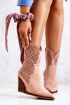 Openwork cowboy boots on a post Pink Caroline