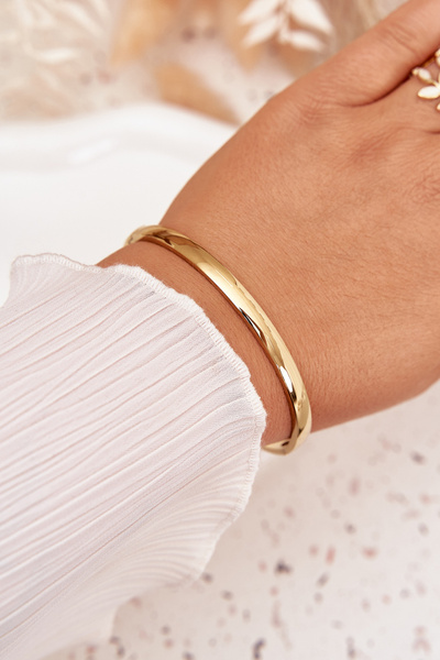 Smooth bracelet made of gold-colored surgical steel